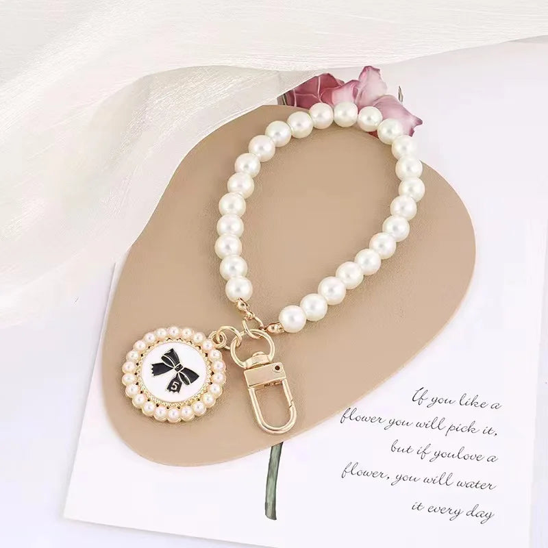 Cute Pearl Keychain for Women Girls Shiny Pearl Bead Shell Phone Bag Backpack Charm Accessory Car Key Key Chain Pendant