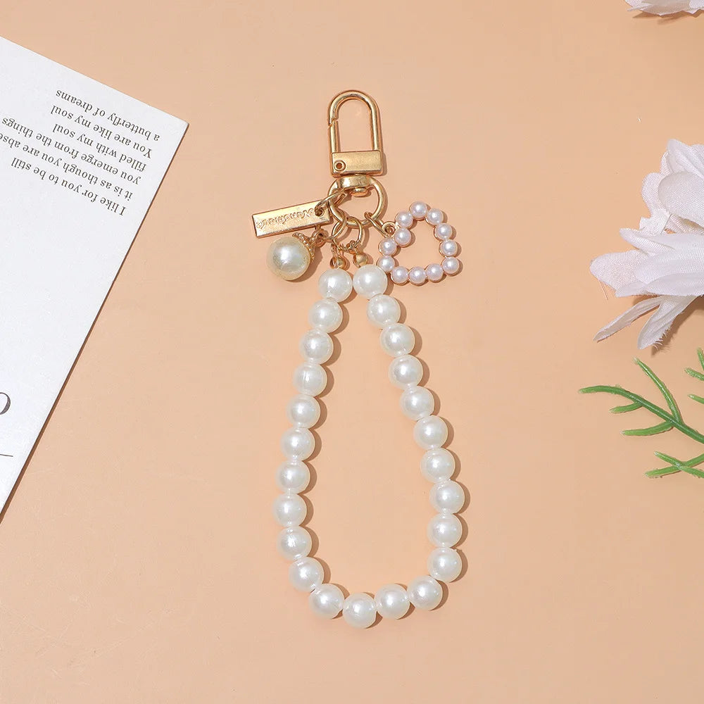 Cute Pearl Keychain for Women Girls Shiny Pearl Bead Shell Phone Bag Backpack Charm Accessory Car Key Key Chain Pendant