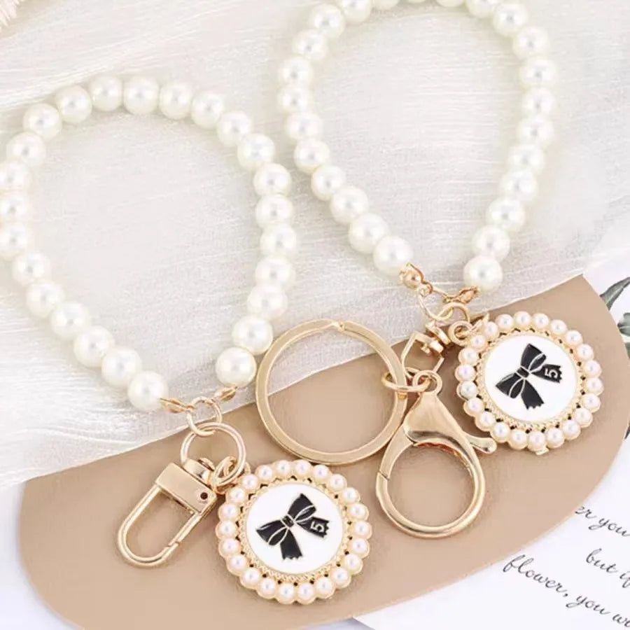 Cute Pearl Keychain for Women Girls Shiny Pearl Bead Shell Phone Bag Backpack Charm Accessory Car Key Key Chain Pendant