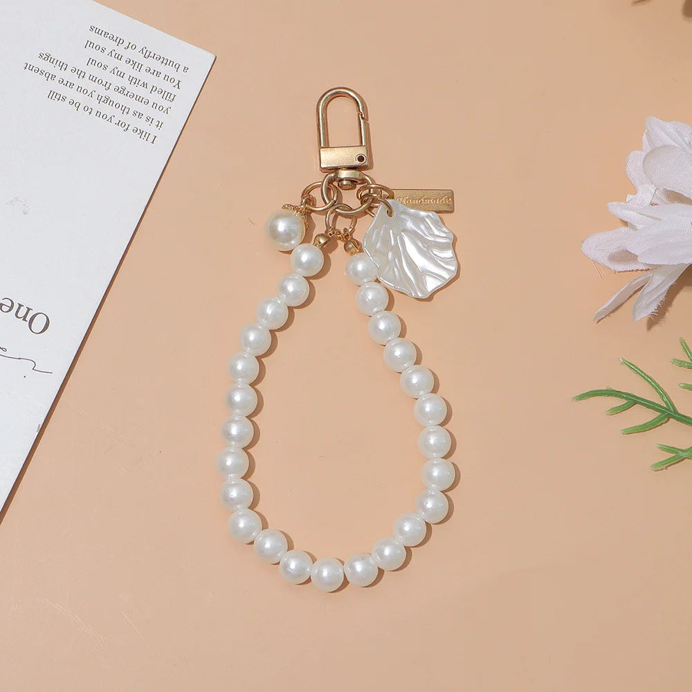 Cute Pearl Keychain for Women Girls Shiny Pearl Bead Shell Phone Bag Backpack Charm Accessory Car Key Key Chain Pendant