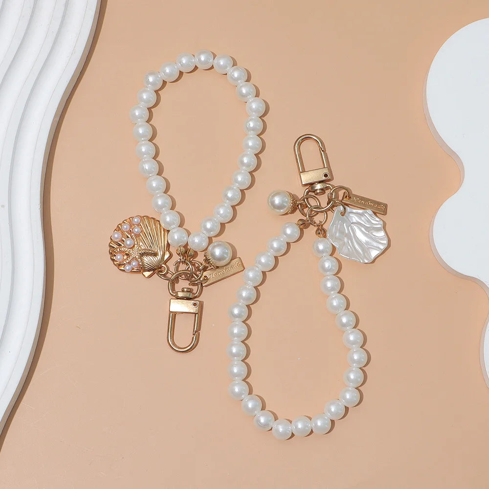 Cute Pearl Keychain for Women Girls Shiny Pearl Bead Shell Phone Bag Backpack Charm Accessory Car Key Key Chain Pendant